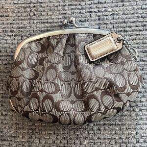 Coach coin purse light tan and gold color